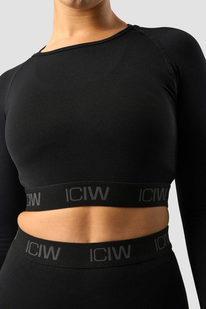 define seamless logo long sleeve crop top black