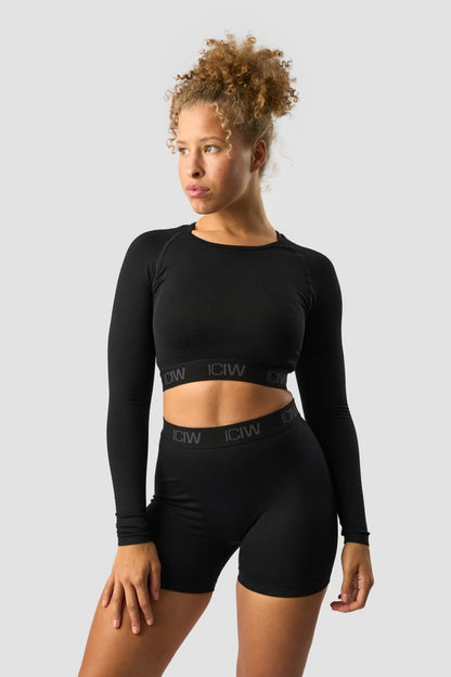 define seamless logo long sleeve crop top black