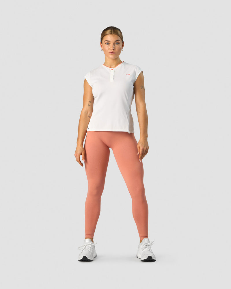 training pique polo white/coral wmn